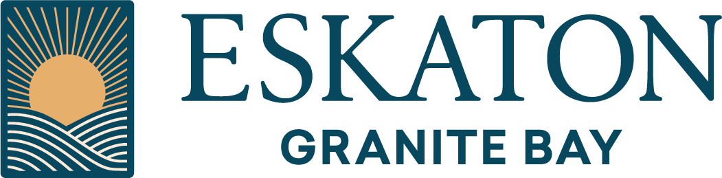 Eskaton Granite Bay logo with a stylized sun rising over wavy lines inside a square, next to the words ESKATON GRANITE BAY in bold, dark teal letters.
